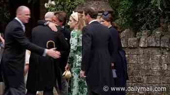 Beatrice and Eugenie welcomed back in the fold by Mike Tindall: Ex-rugby ace led the way in greeting the York sisters and wrapped Edo in a bear hug