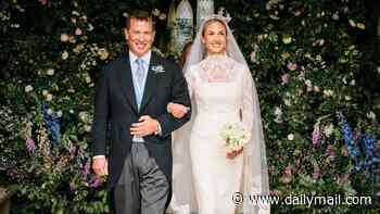 Newlywed bliss! Peter Phillips and wife Harriet Sperling beam in official wedding portraits