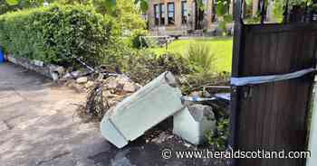 Four passengers injured after bus crashes into garden