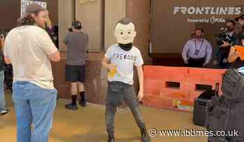 'Deserved To Die!' Protester Mimics Charlie's Death With Papier-Mâché Head at Turning Point USA Event