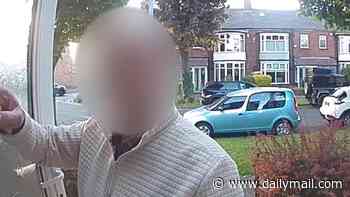Moment furious homeowner attempts to storm into neighbour's property demanding he 'fight like a man' over 'petty' parking row