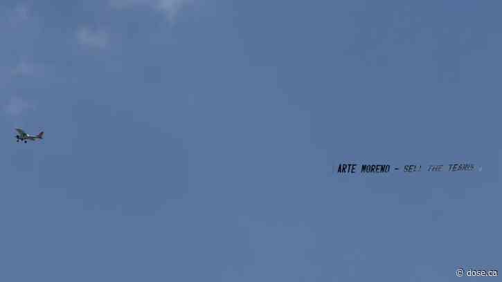 Angels fans send a message to Arte Moreno in the sky