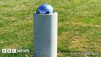 Village solar system model shows planets and stars