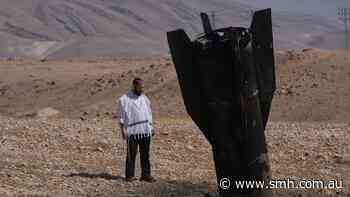‘Fire is on hold’: Iran, Israel halt strikes, but threaten to respond to any new attacks