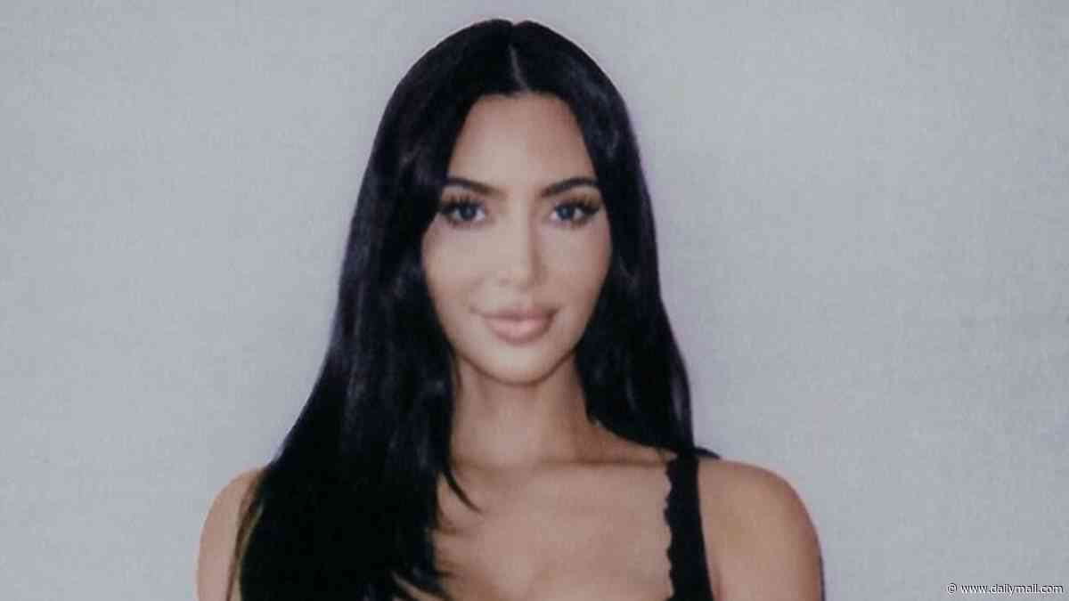 Lewis Hamilton shares polaroid snap of girlfriend Kim Kardashian posing with his race helmet during show-stealing Monaco Grand Prix stint after he broke his silence on their romance