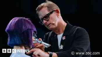 Ex-footballer becomes 'rock star' hairdresser