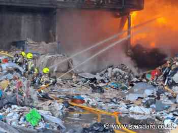 Huge recycling centre fire brought under control after London Bridge rail chaos