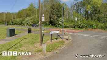 Woman in hospital and driver arrested after crash