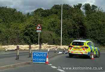 Police called after wooden pallets fall off lorry on busy roundabout