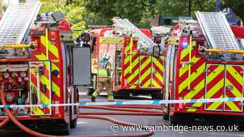 Firefighters tackle house blaze on busy Cambridge road