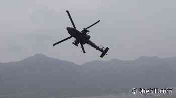 Helicopter crew rescued by unmanned Navy vessel near Strait of Hormuz