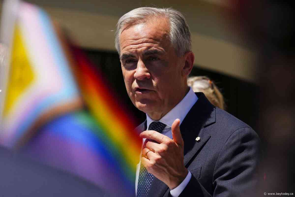 Carney, MPs raise Pride Flag on Parliament Hill