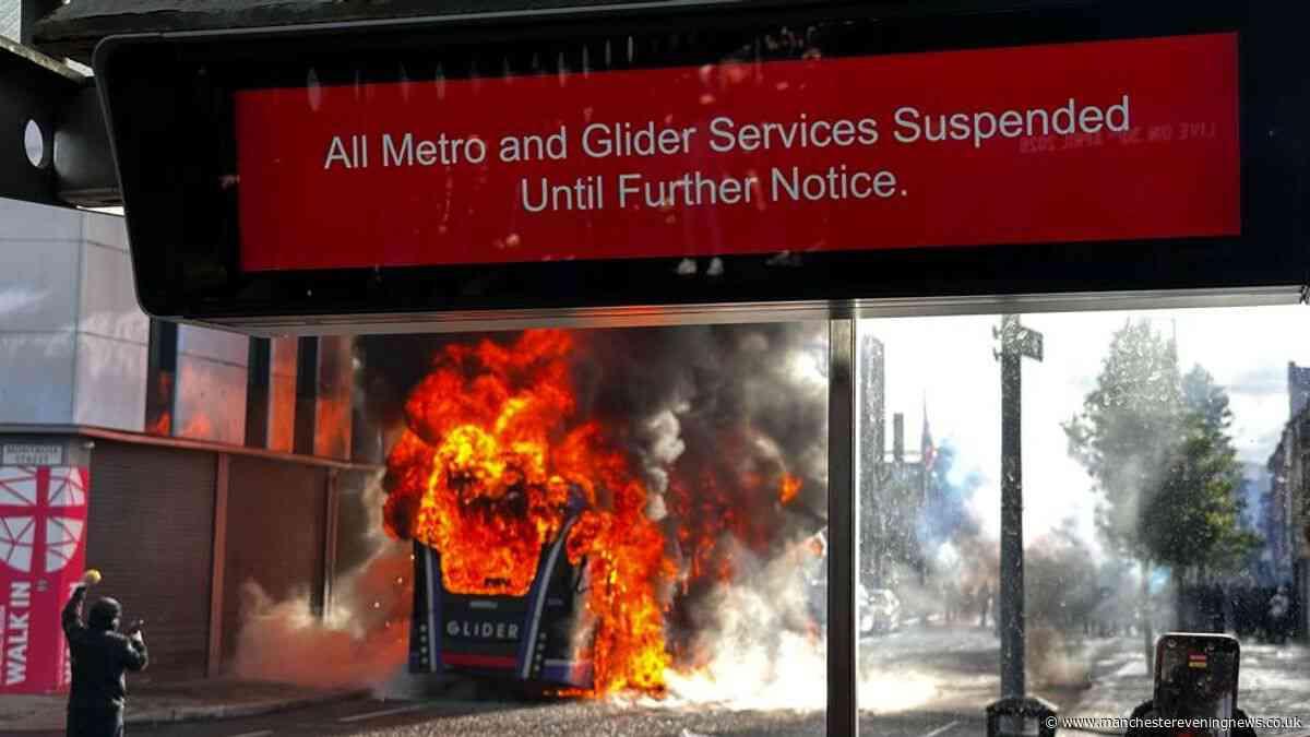Protesters in Belfast set fire to bus following knife attack in city