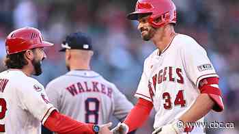Cancer survivor Trey Mancini completes MLB comeback with 3 hits in start for Angels