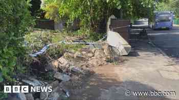 Four passengers injured after bus crashes into front garden