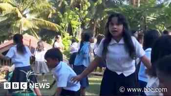 Schoolchildren run from collapsing roof as ground shakes in Philippines quake