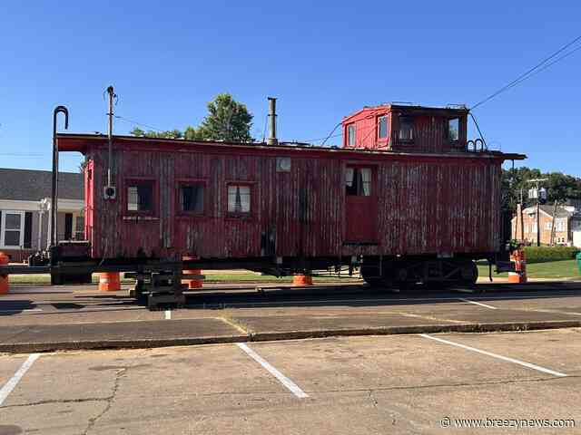 Photos: Caboose stops near Attala County Tax Collector office as relocation continues