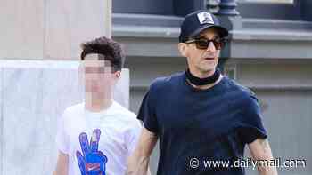 Adrien Brody holds hands with girlfriend Georgina Chapman's son, 13, in NYC… after jailed Harvey Weinstein reacted to the actor raising his kids