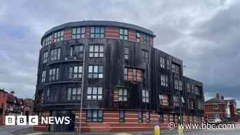 Residents leave 'hellhole' flats for cladding work