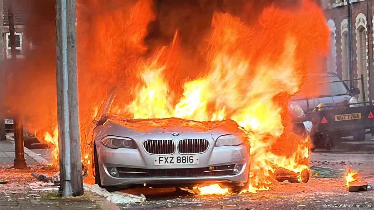 Homes and cars torched across city as violent disorder erupts around Belfast