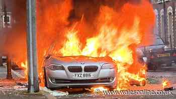 Homes and cars torched across city as violent disorder erupts around Belfast