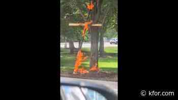 Watch: Large burning cross found at Chicago park