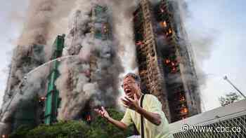 Hong Kong charges 7 people, 2 firms over deadly fire that killed 168 people
