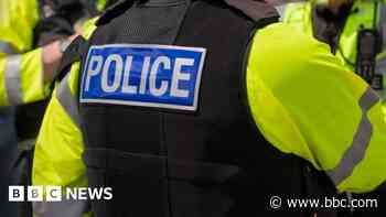 Man charged after taxi driver racially abused