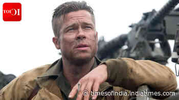 Brad Pitt and combat dog Odin face danger in 'Heart of the Beast' first look