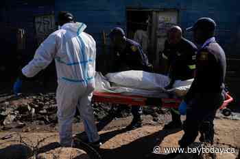 Multiple attackers kill 12 people and wound 9 in a late-night shooting in South Africa