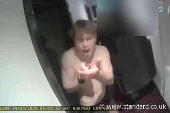 Alleged smiling assassin pretended to shoot armed police with hands, court told