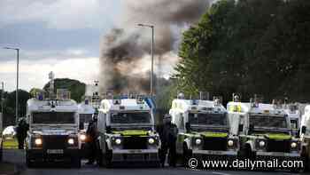 Rioters share 'hit list' of migrant homes in Belfast as explosions heard and protesters confront police on second night of unrest