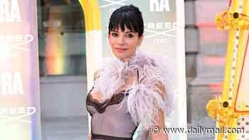 Lily Allen wows in stunning mesh dress and dramatic feather boa just hours after ex David Harbour called her break up album 'weird' - as she leads the stars at Royal Academy of Arts summer party