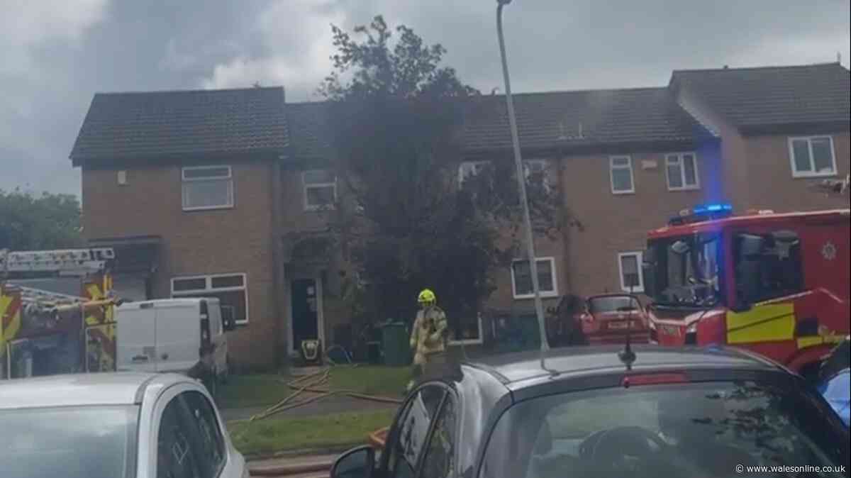 Smoke billows from house as fire crews tackle blaze on Cardiff street