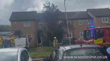 Smoke billows from house as fire crews tackle blaze on Cardiff street