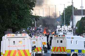 Riot police fire water cannon at protesters as second night of Belfast disorder erupts