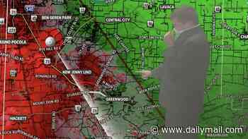 Brave meteorologist stays on air during smoky studio fire so that he can report tornado warning