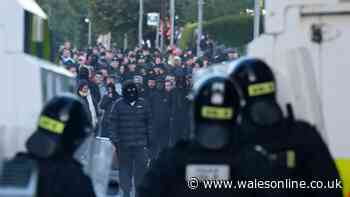 Police in Northern Ireland hit with petrol bombs as MPs condemn ‘racist thuggery’