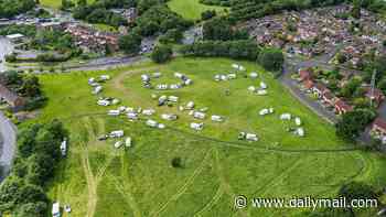 Families are 'living in fear' as travellers set up illegal 40-caravan camp near girls' secondary school