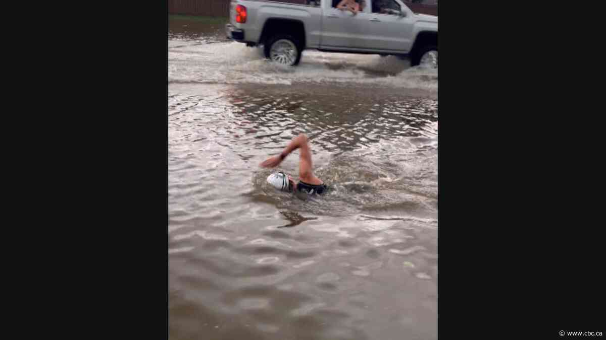 #TheMoment he swam in Manitoba floodwaters