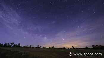 Why do stars appear different colors in the night sky?