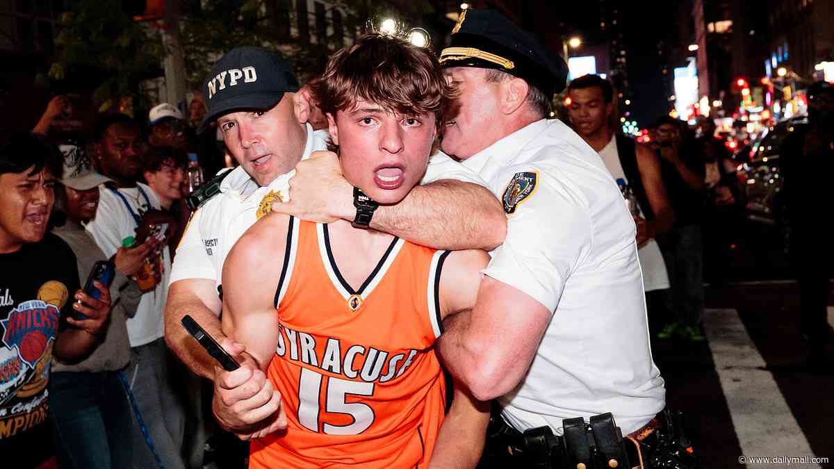 Pandemonium in New York as Knicks fans flood the streets after historic comeback - as supporters SMASH yellow cabs and light explosives while waving Palestinian flags