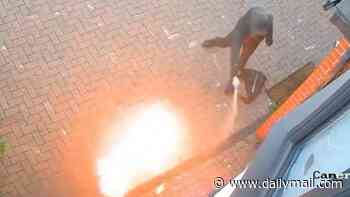 Moment Imam's family home is 'firebombed' by masked thug in terrifying attack