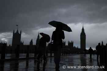 'Where has summer gone?' Londoners bemoan the awful weather as torrential rain sweeps capital