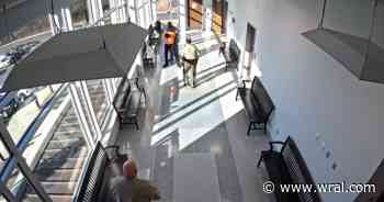 Video shows deputy take swing at truck driver in courthouse, driver fights back