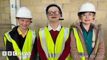 Children fill time capsule to be opened in 2056