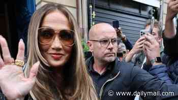 Jennifer Lopez looks chic in a pinstripe suit as she heads to David Guetta's show in Paris after revealing which Hollywood stars she wants to sleep with