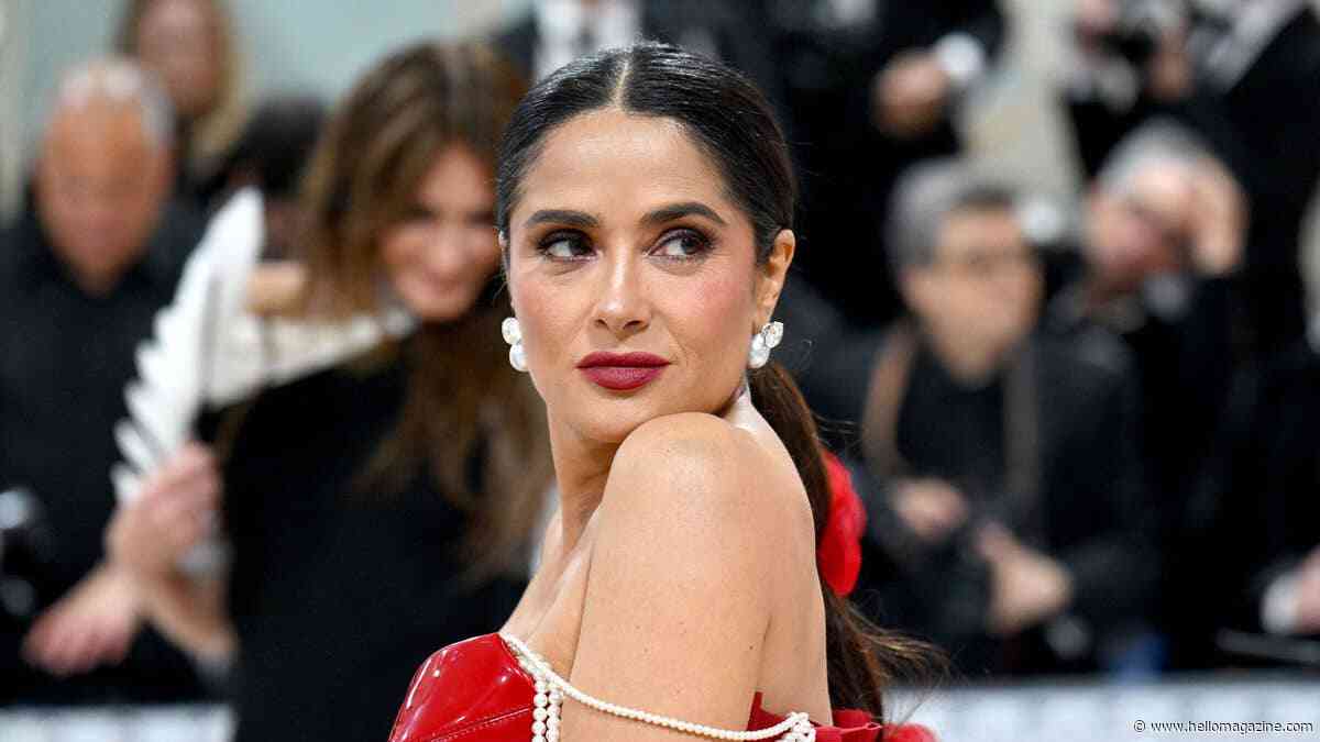 Salma Hayek shows off curvy physique in bold red power suit during World Cup surprise