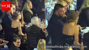 Travis joins Taylor at Hall of Fame ceremony - WATCH