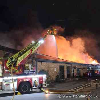 Huge fire rips through north London warehouse as 150 firefighters tackle blaze